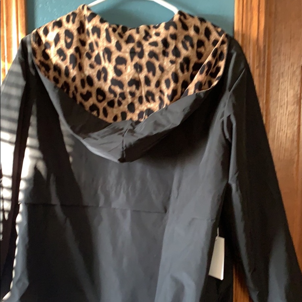Black 1/2 zip windbreaker with leopard hood